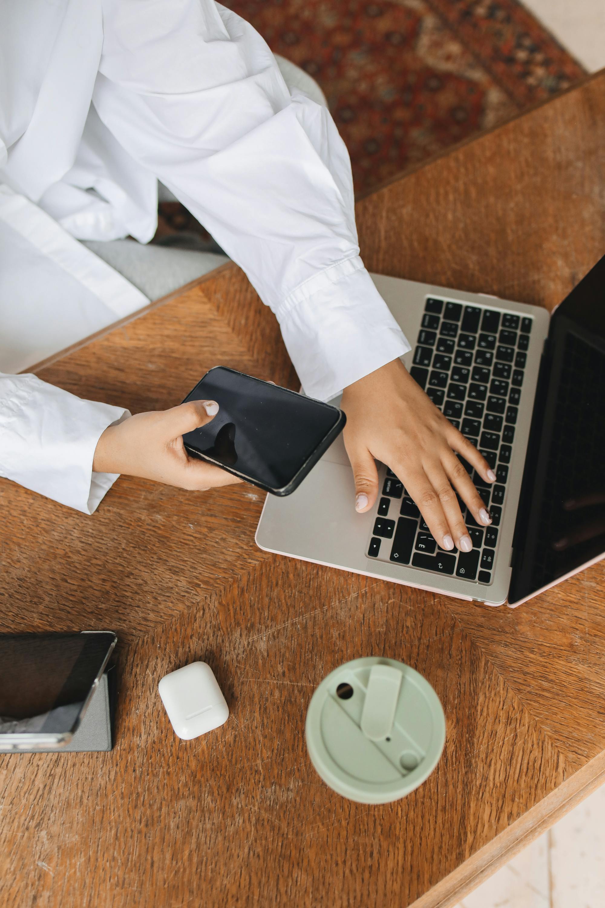 Modern workspace with laptop and smartphone